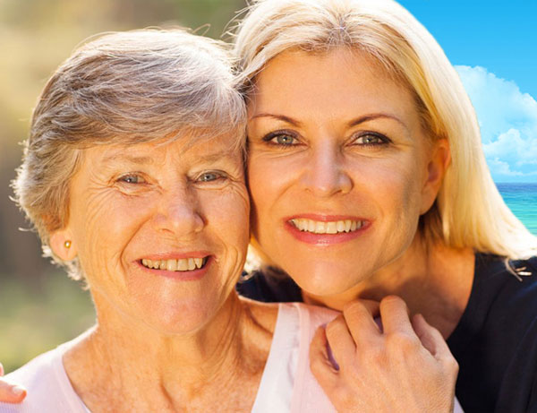 Portrait of older and younger woman.